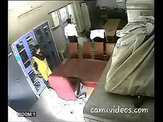 A indian school motor coach banging a fellow teacher.